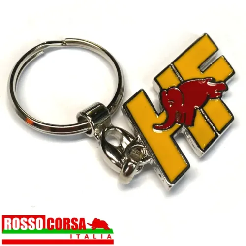Keychain with HF logo. The logo is made of enameled steel and is a more modern version of the HF logo, in yellow with a red elephant.
