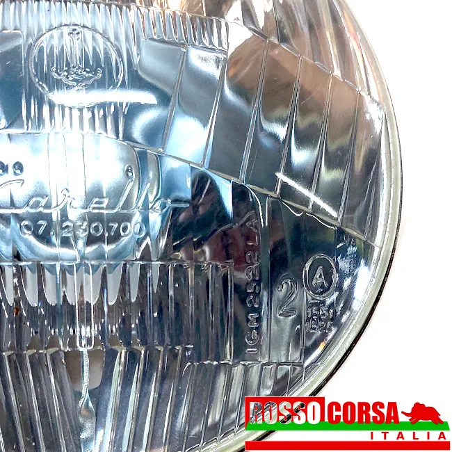 ruppo ottico anteriore centrale Fulvia 1°serie. Originale Carello, usato ottime condizioni. Dettaglio scritte faro