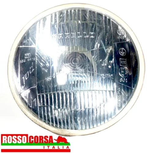 Central front headlight Fulvia 2nd series. Original Carello, used in excellent condition. Front view of the headlight