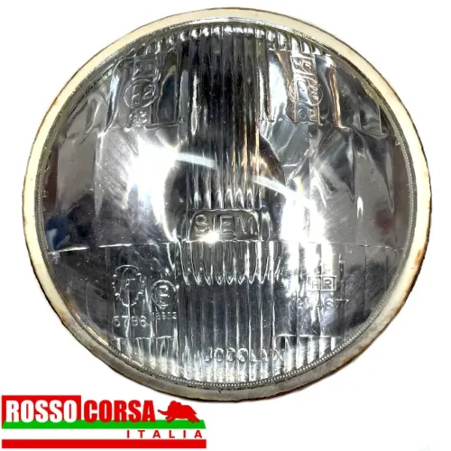 Central front headlight Fulvia 2nd series. Original Siem, used in excellent condition. Front view of the headlight