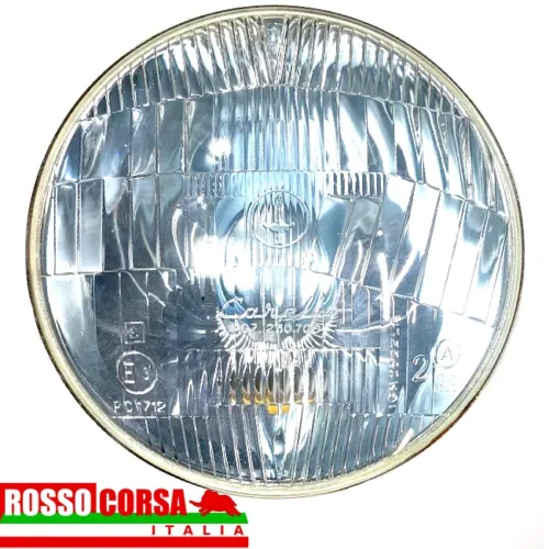 Lateral front headlight Fulvia 1st series. Original Carello, used in excellent condition. Front view of the headlight